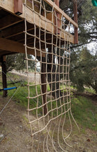 Load image into Gallery viewer, Climbing Net  8&quot; Squares Pro Manila Affordable Quality - picture in use - shows use of top loops to mount to 2x4 - different angle