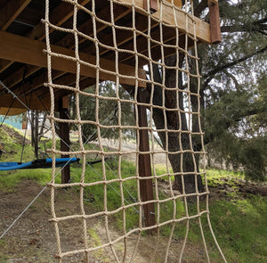 Climbing Net  8" Squares Pro Manila Affordable Quality - picture in use - shows use of top loops to mount to 2x4 - different angle again