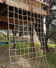 Load image into Gallery viewer, Climbing Net  8&quot; Squares Pro Manila Affordable Quality - picture in use - shows use of top loops to mount to 2x4